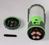 camping lantern with battery compartment open and battery barrier strip