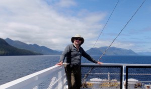 a passenger on the deck of a ferry