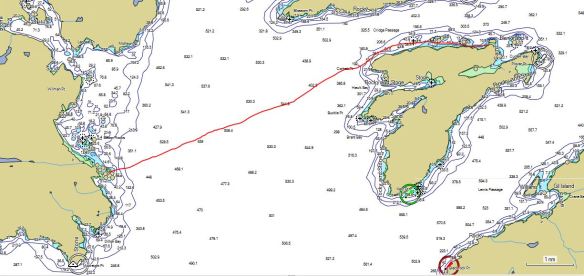 a marine chart with a course line in red