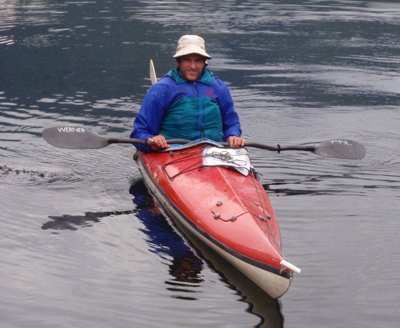 Andy Linger, sitting in his sea kayak