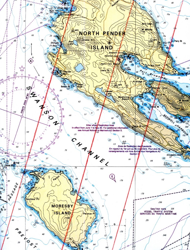 A section of marine chart, showing the lines of magnetic North drawn in with red, to allow plotting Lines Of Position without adding or subtracting for compass variation.