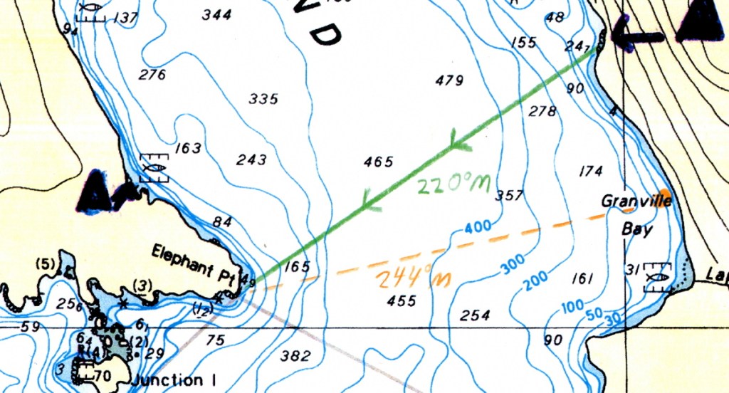 A section of a marine chart with a pre-plotted bearing and a taken bearing south of it.