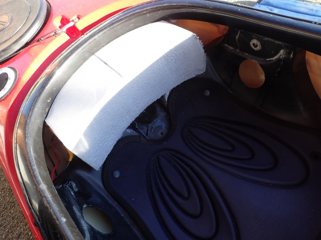 Showing a home-made foam seat backbrace for my sea kayak.