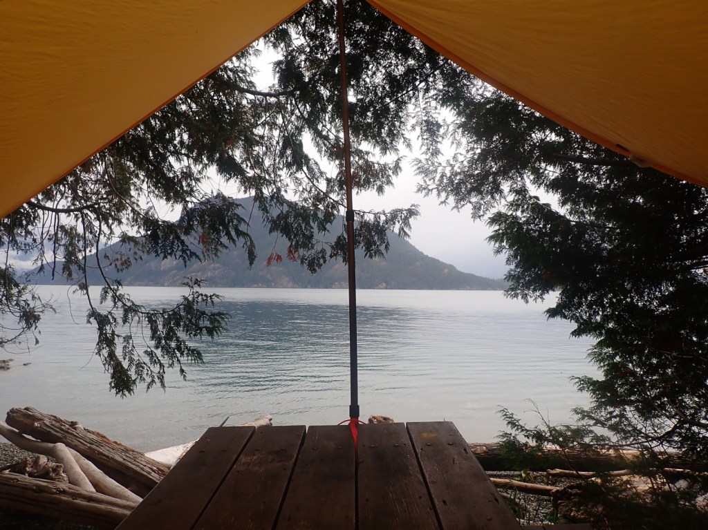 a view of Anvil Island, Howe Sound, British Columbia, from under a tarp on Gambier Island